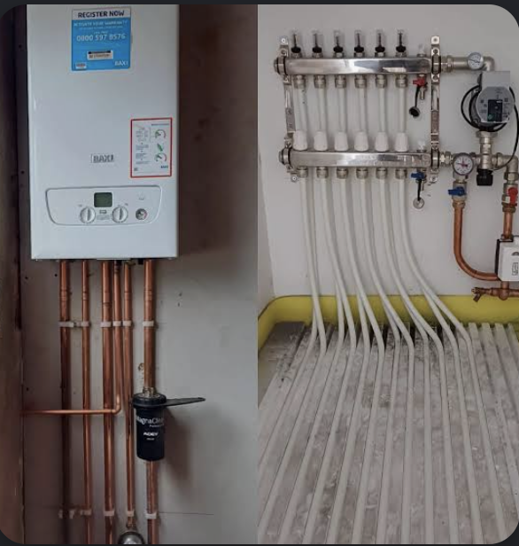 A Baxi boiler alongside an underfloor heating manifold with pipes laid ready for the screed