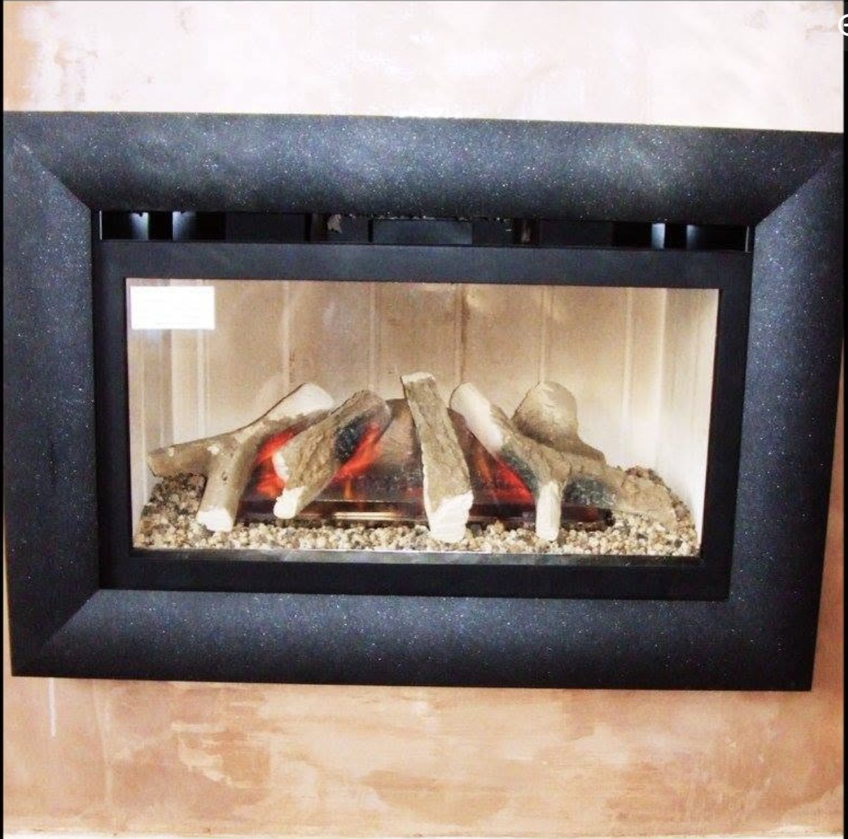 A new gas fire fitted into a chimney breast